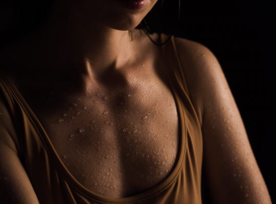 close up photo of wet chest of a woman