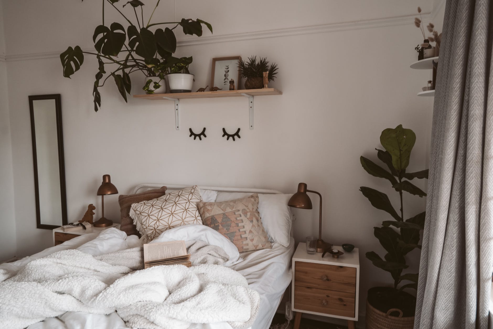 photo of lamp beside bed